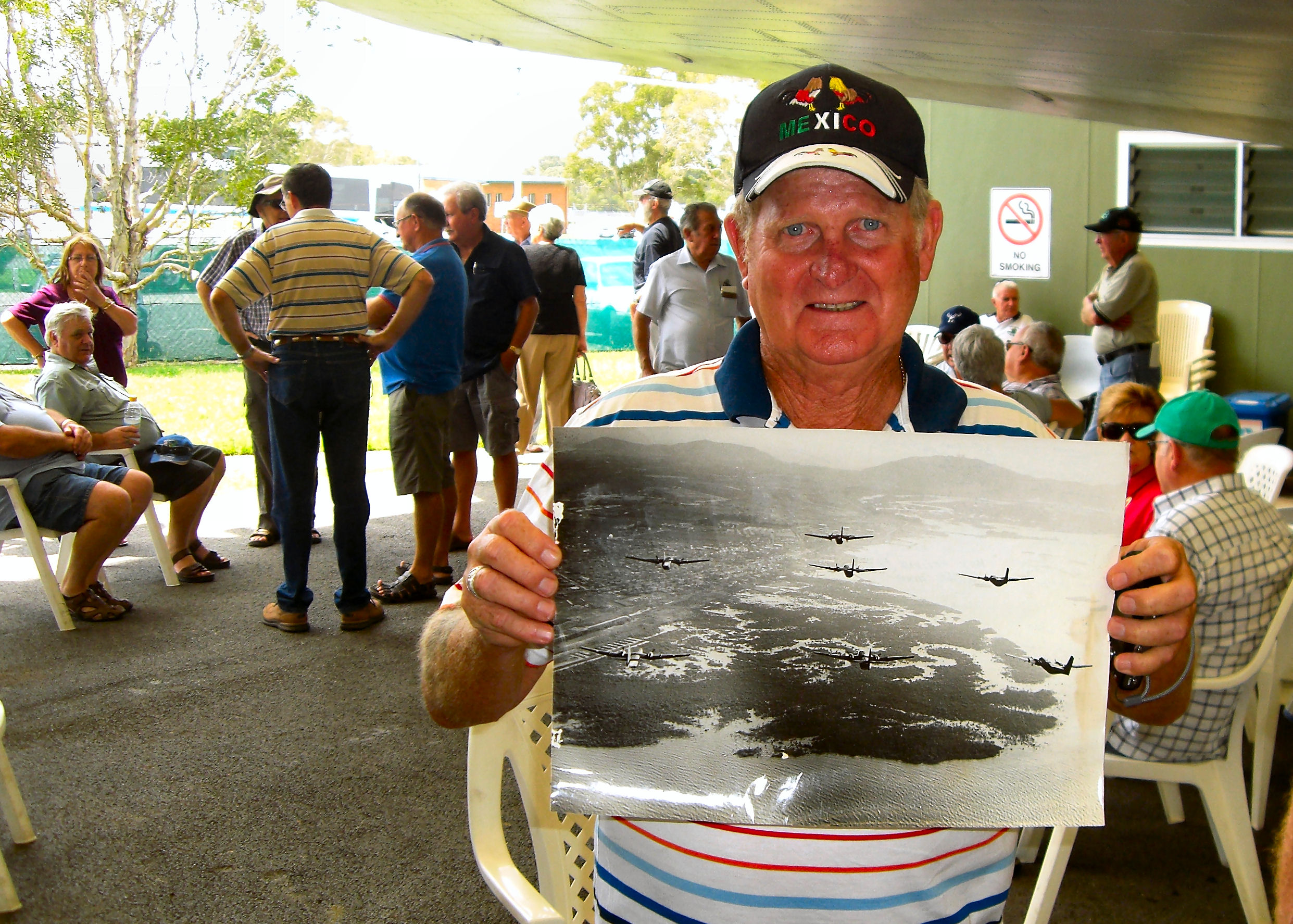 Geoff Hall and the photo of the Sqn in the air