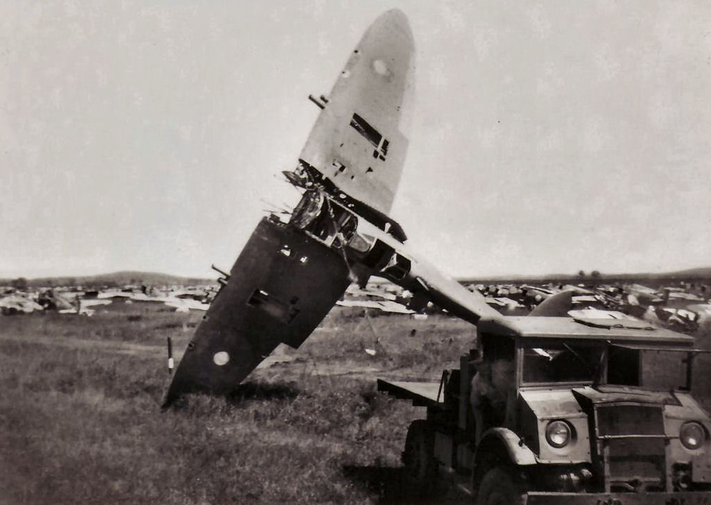 Spitfire being towed for disposal